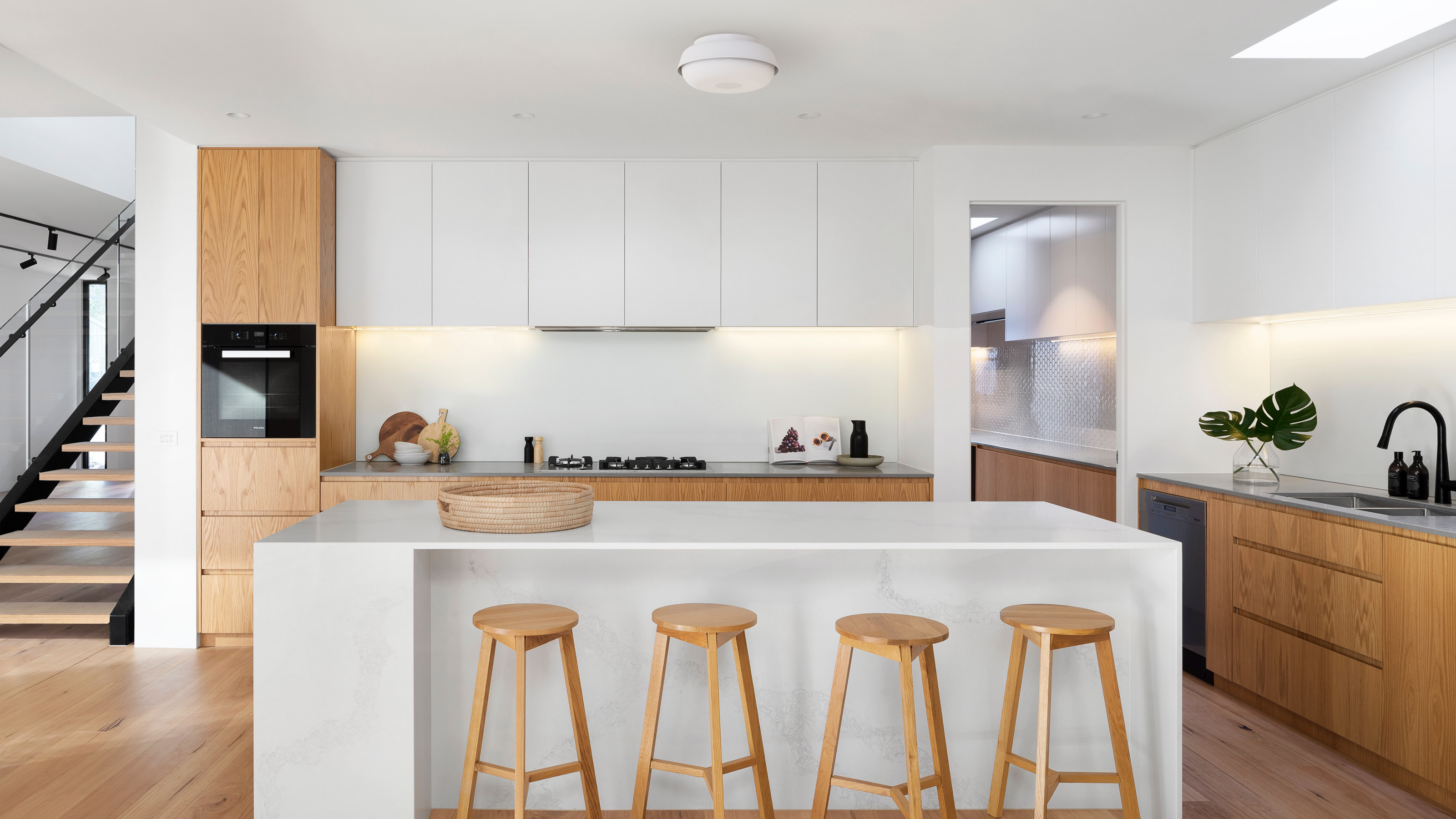 a kitchen with the lamp installed
