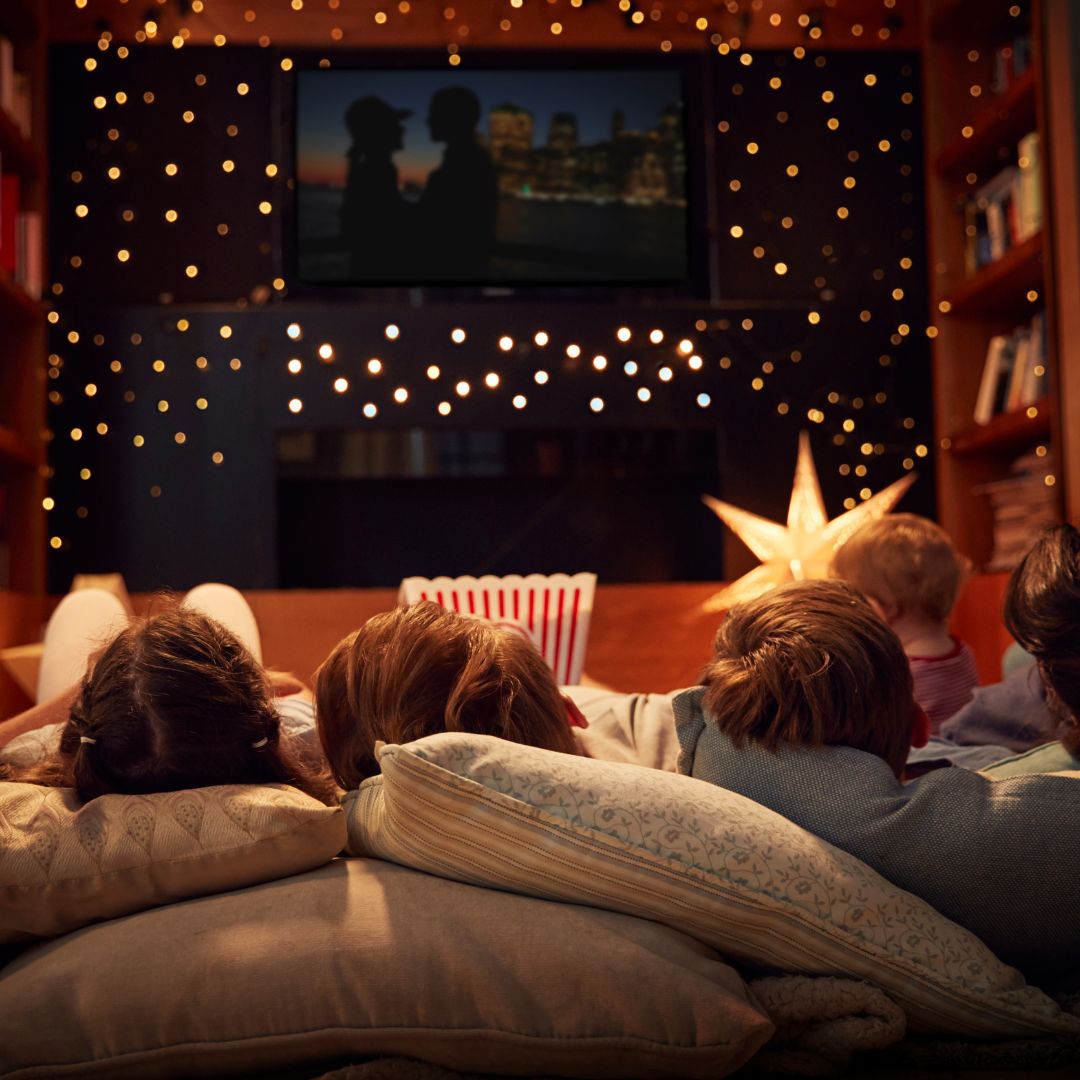 family enjoying a movie night
