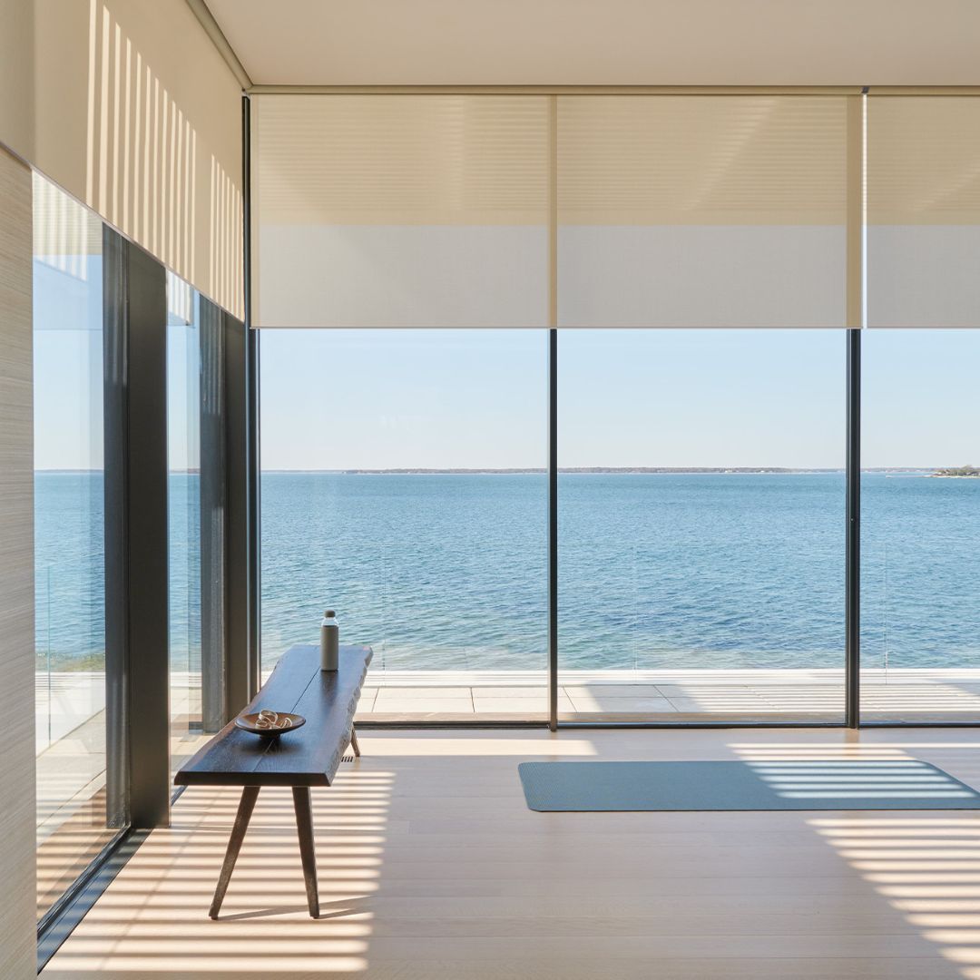 living room with roller blinds raised