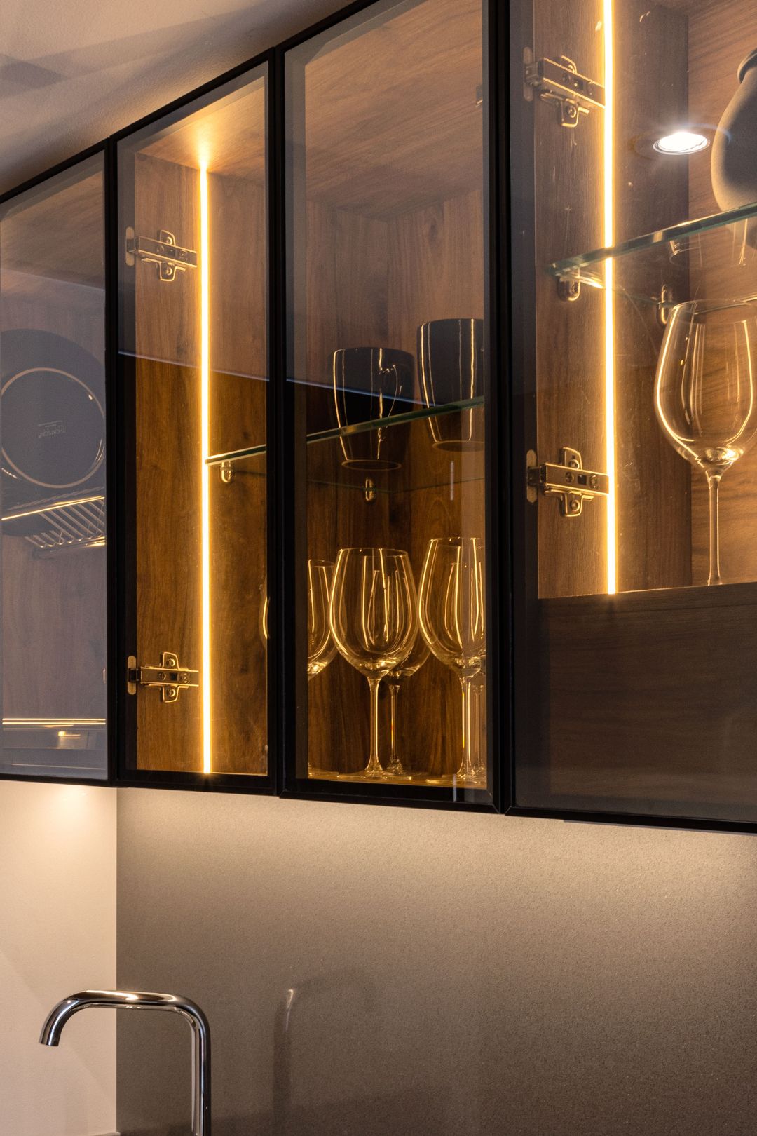 LED lighting inside a cupboard with a glass door