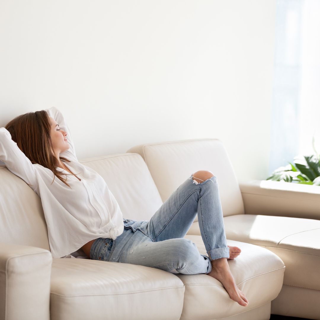 woman sitting comfortably in an armchair