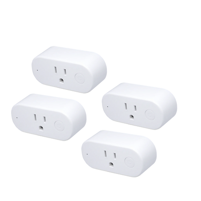 Four white smart plugs on a white background