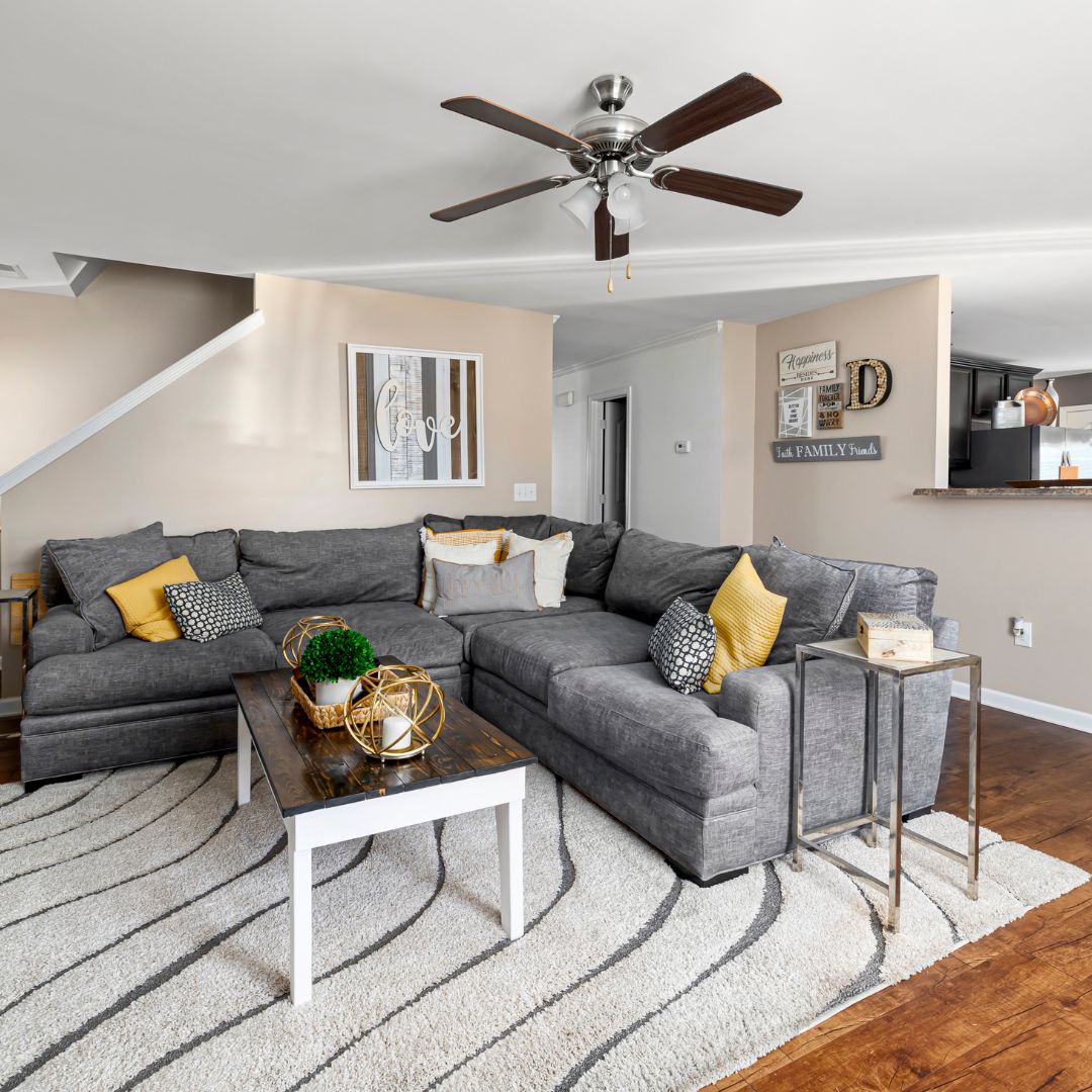 living room with ceiling fan