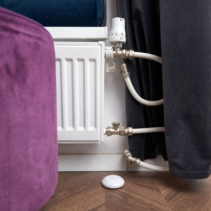 Shelly flood sensor under a radiator